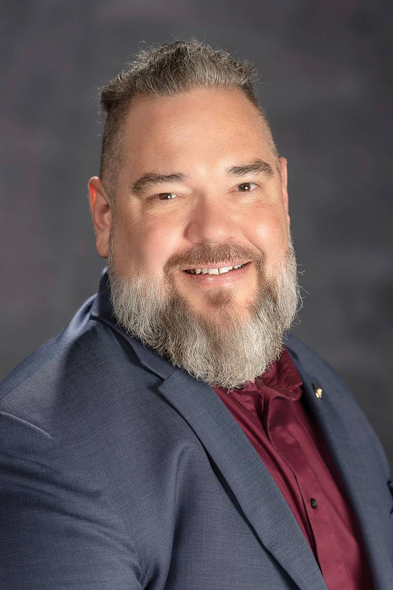 Institutional Officer Profile Photo for Biography details